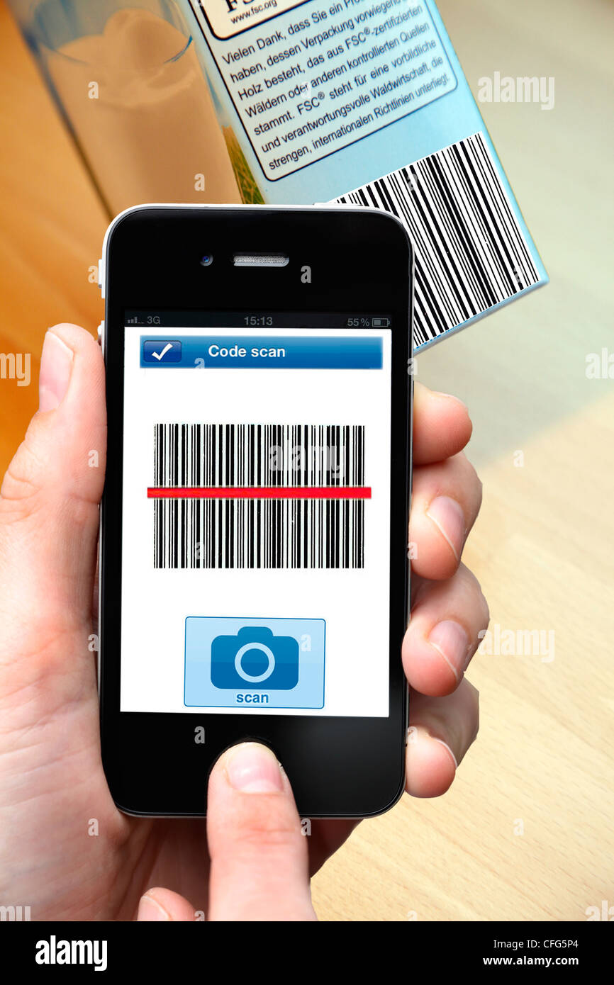 Mobile phone, smart phone, PDA, I phone, with a barcode reader App. To read barcode information on products. Stock Photo