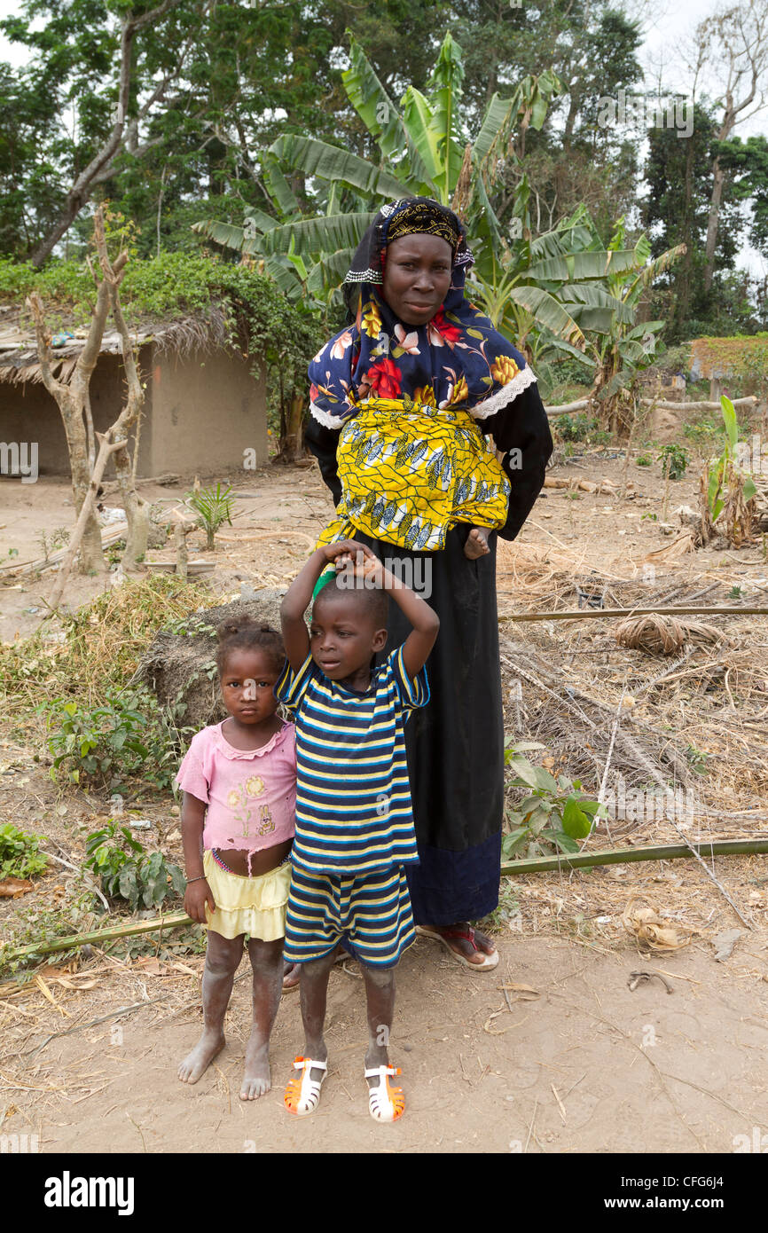 A mother and her children in a village near Dukoue,Ivory Coast ,Cote  d'Ivoire,West Africa Stock Photo - Alamy