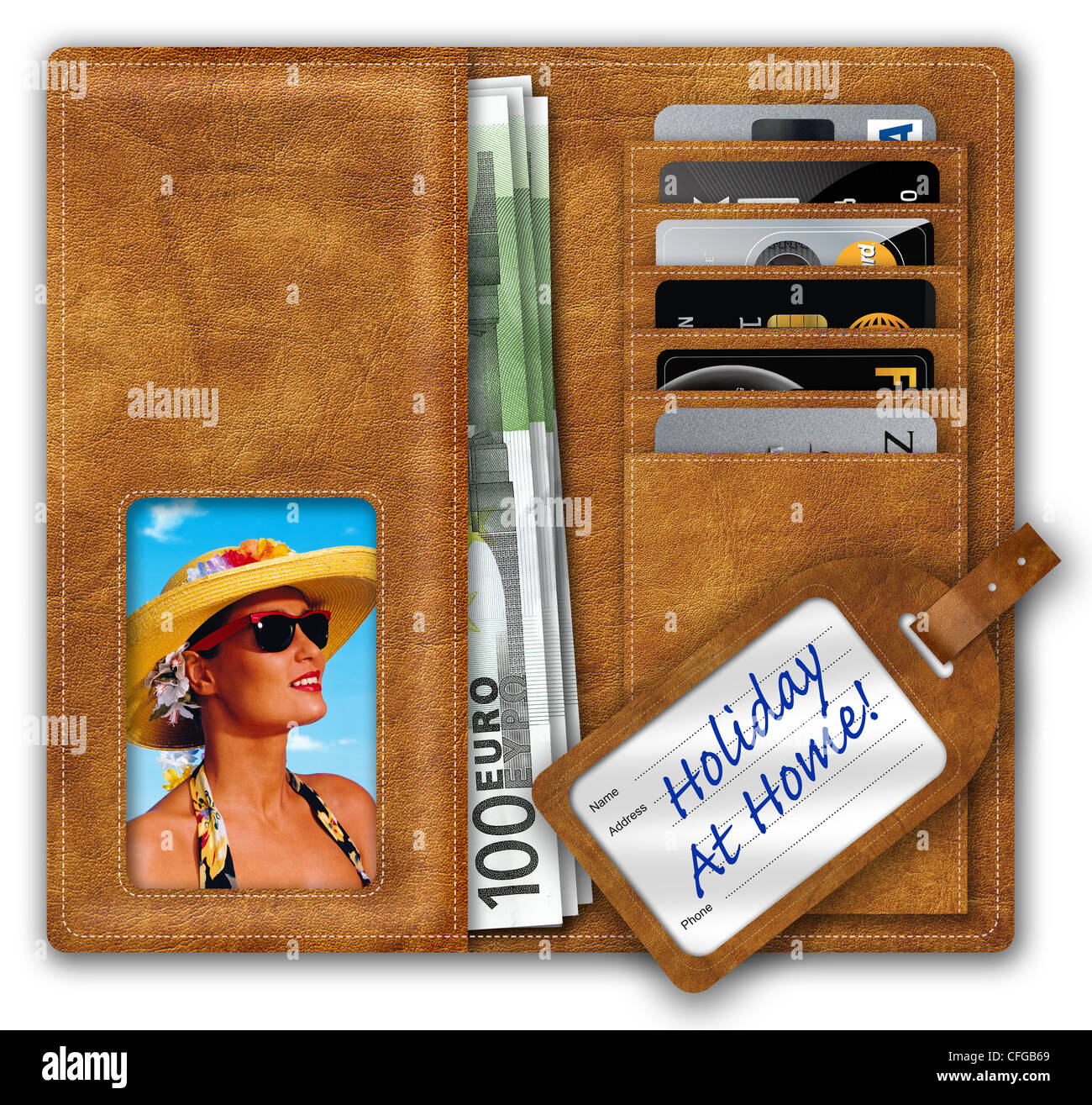 Wallet containing Euros and credit cards, picture of holdaymaker and Holiday At Home luggage label. Stock Photo