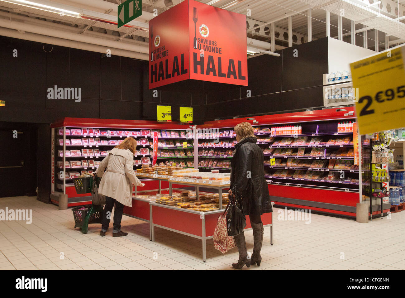 Women look at Halal products in a supermarket in Nantes, France, 9 March 2012. Stock Photo