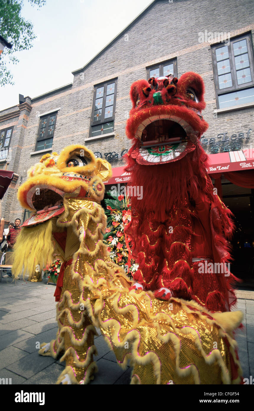 China, Shanghai, French Concession Area, Xintiandi, Lion Dance Performance Celebrating the Opening of a New Business Stock Photo