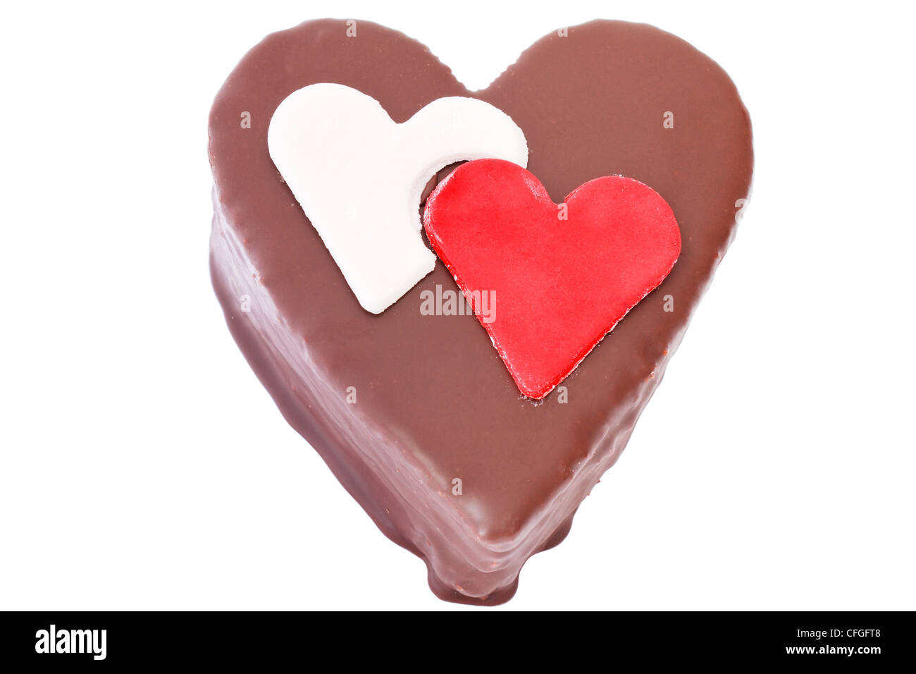 Heart shaped slice of a chocolate-cake on white background Stock Photo
