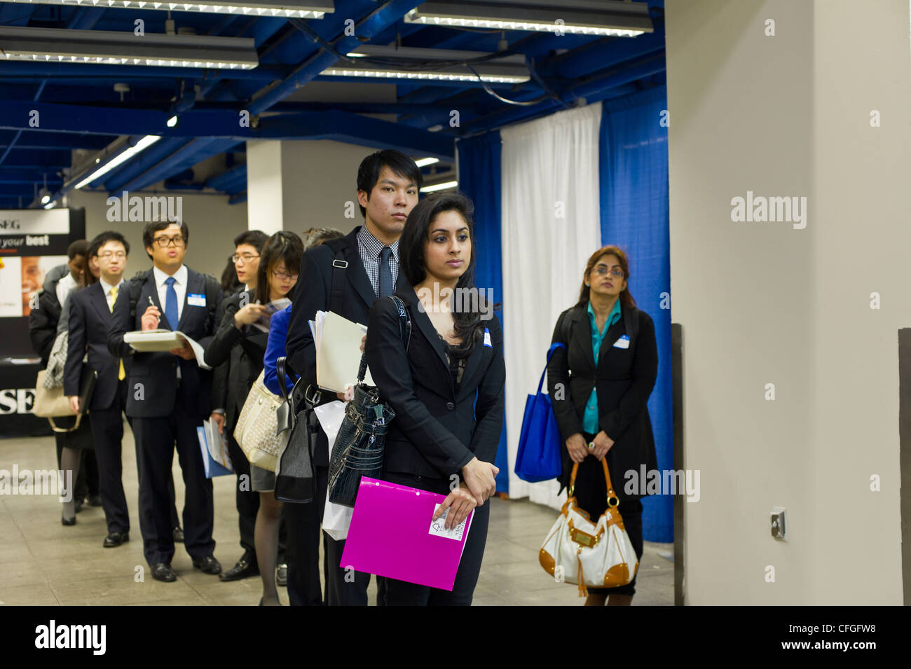 Job seekers attend a job fair in midtown in New York Stock Photo