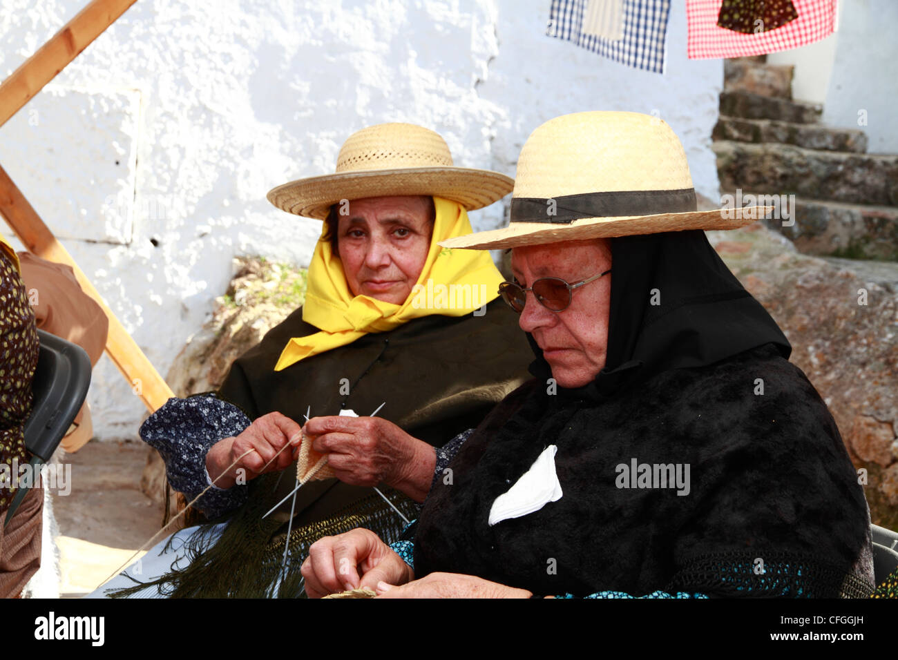Elderly women in traditional costume at a handicraft fair, Ibiza, Spain Stock Photo