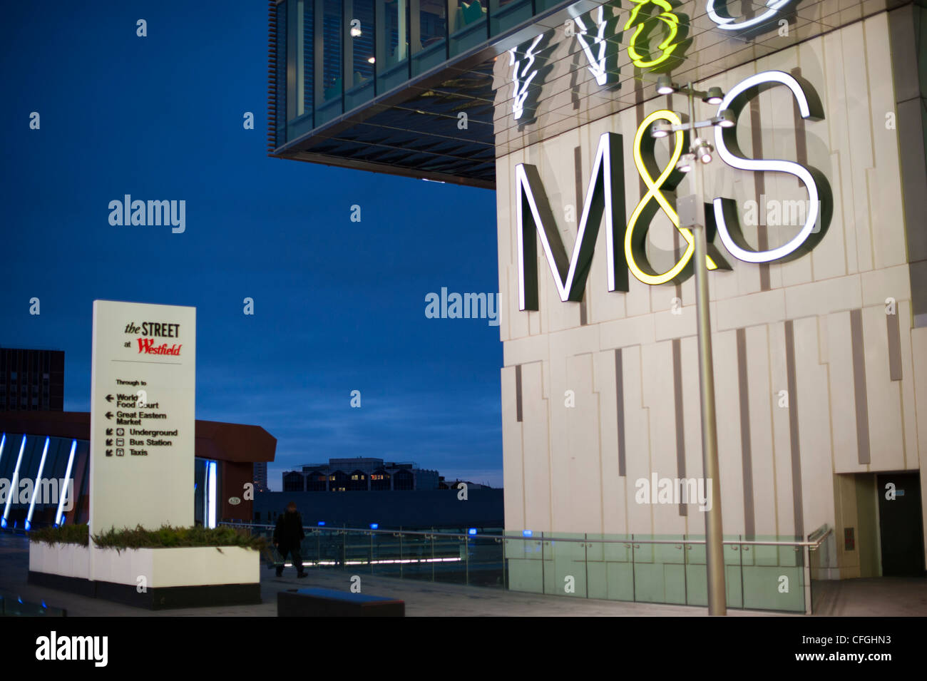 Marks and Spencer shop and sign at the Street Westfield shopping centre near the olympic park Stratford London at dawn. Stock Photo