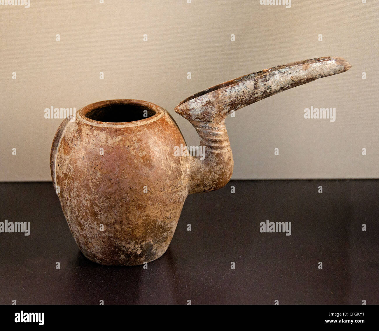 https://c8.alamy.com/comp/CFGKY1/vase-has-long-spout-gutter-14-12-centuries-bc-marlik-area-southwestern-CFGKY1.jpg