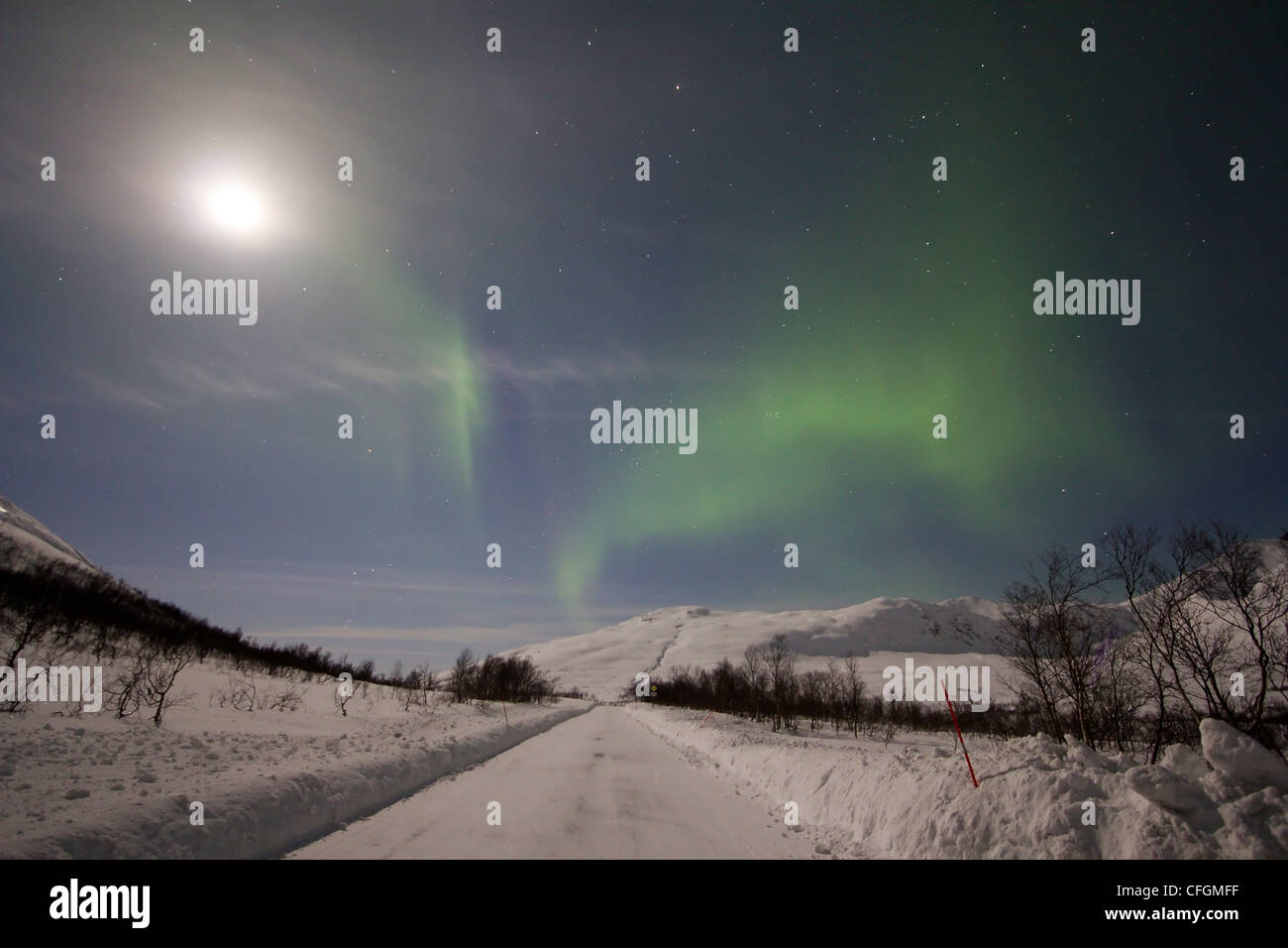 Aurora borealis or northern lights moving across night sky within the Arctic Circle Tromso Troms  region norway 2012 Stock Photo