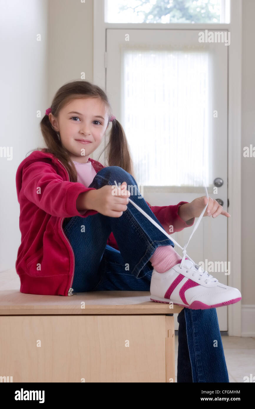 Young Girl Tying Shoe Laces, Toronto, Ontario Stock Photo Alamy
