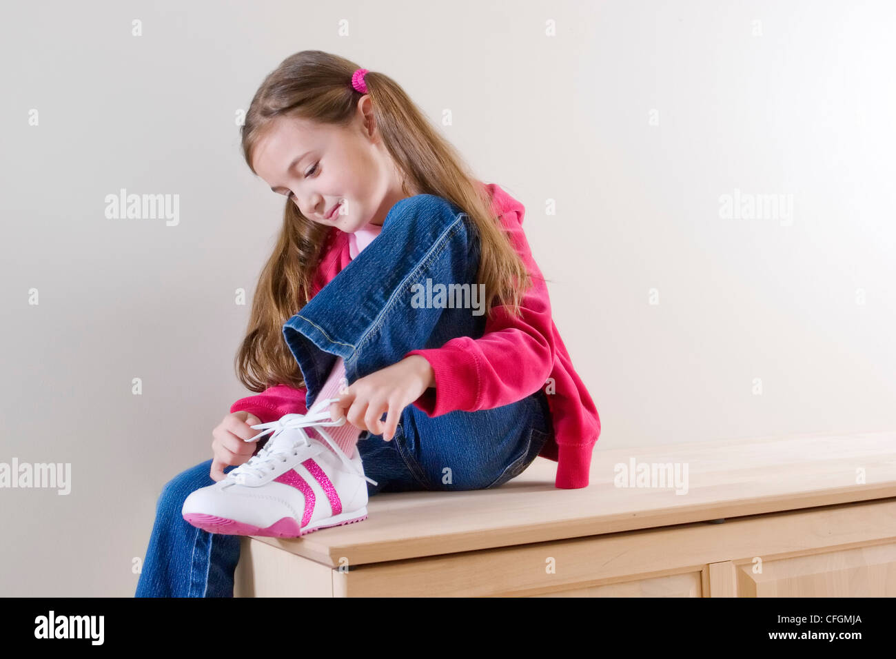 Young Girl Tying Shoe Laces, Toronto, Ontario Stock Photo Alamy