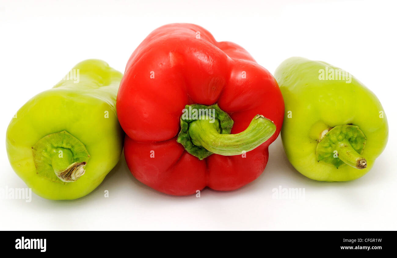 Red and green pepper placed on the white background Stock Photo - Alamy
