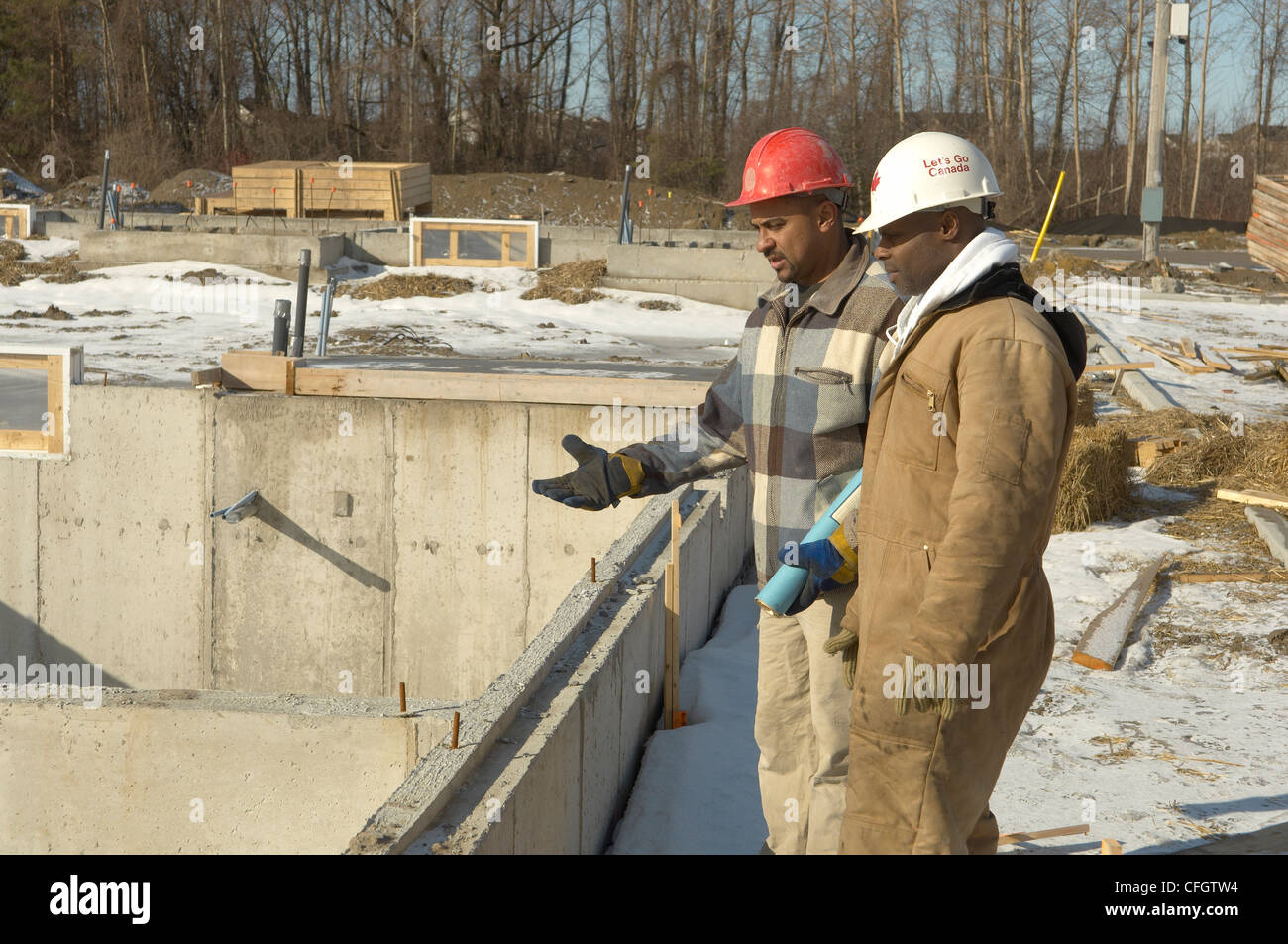 Construction Workers at New Housing Development, Ajax, Ontario Stock Photo