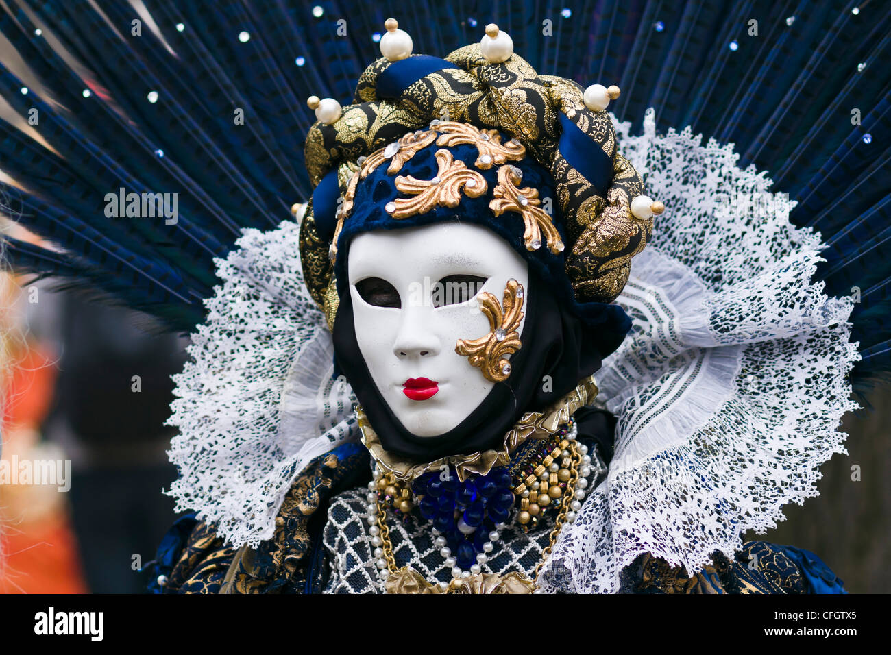 Venetian carnival mask costume parade Stock Photo - Alamy