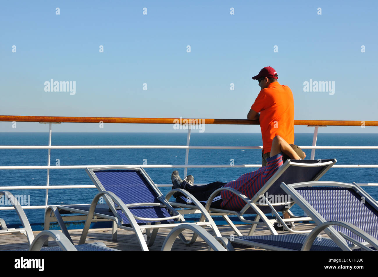 Cruise ship passengers deck chair hi-res stock photography and images ...