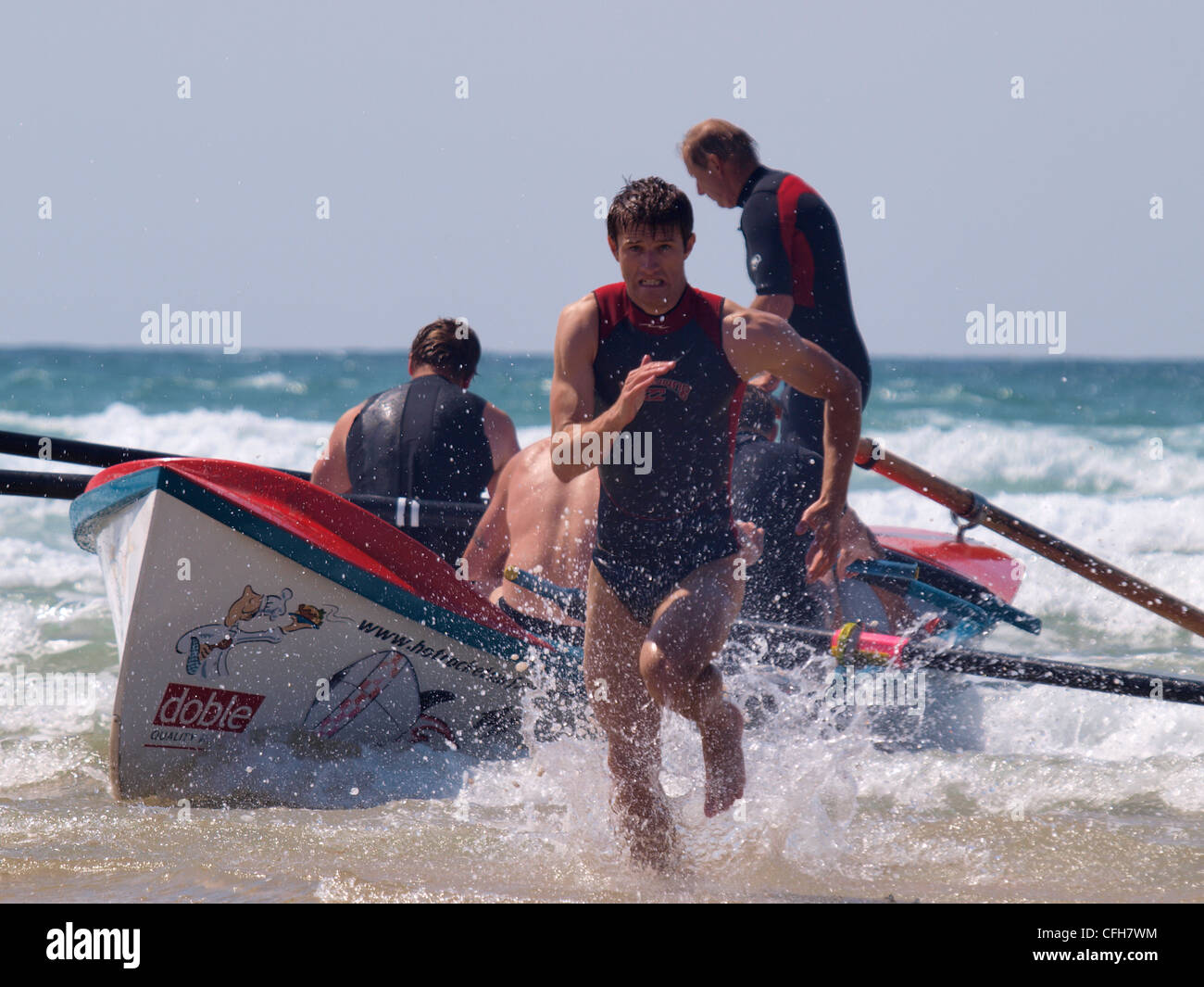 Running for the winning post, Surfboat Racing, Watergate Bay, 2011, Cornwall, UK Stock Photo