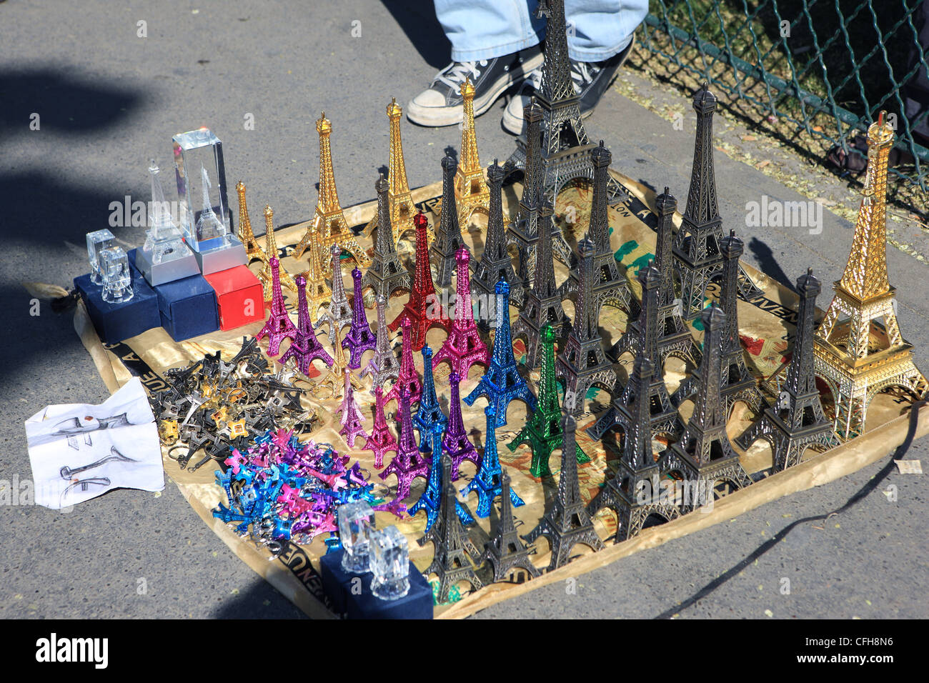 Eiffel Tower souvenirs on sale in the French streets near the tower in Paris Stock Photo