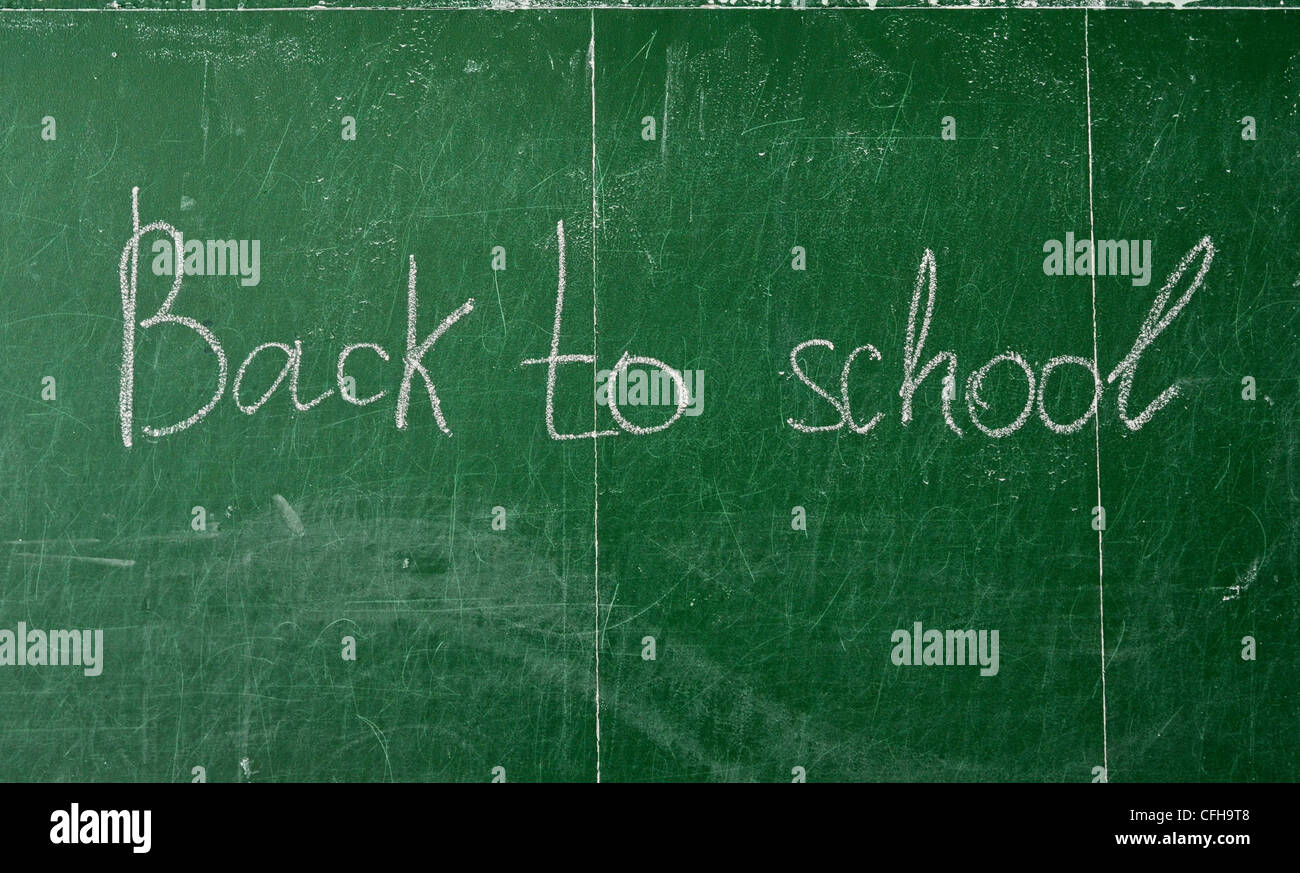 Green chalk blackboard written Back To School with white chalk Stock ...