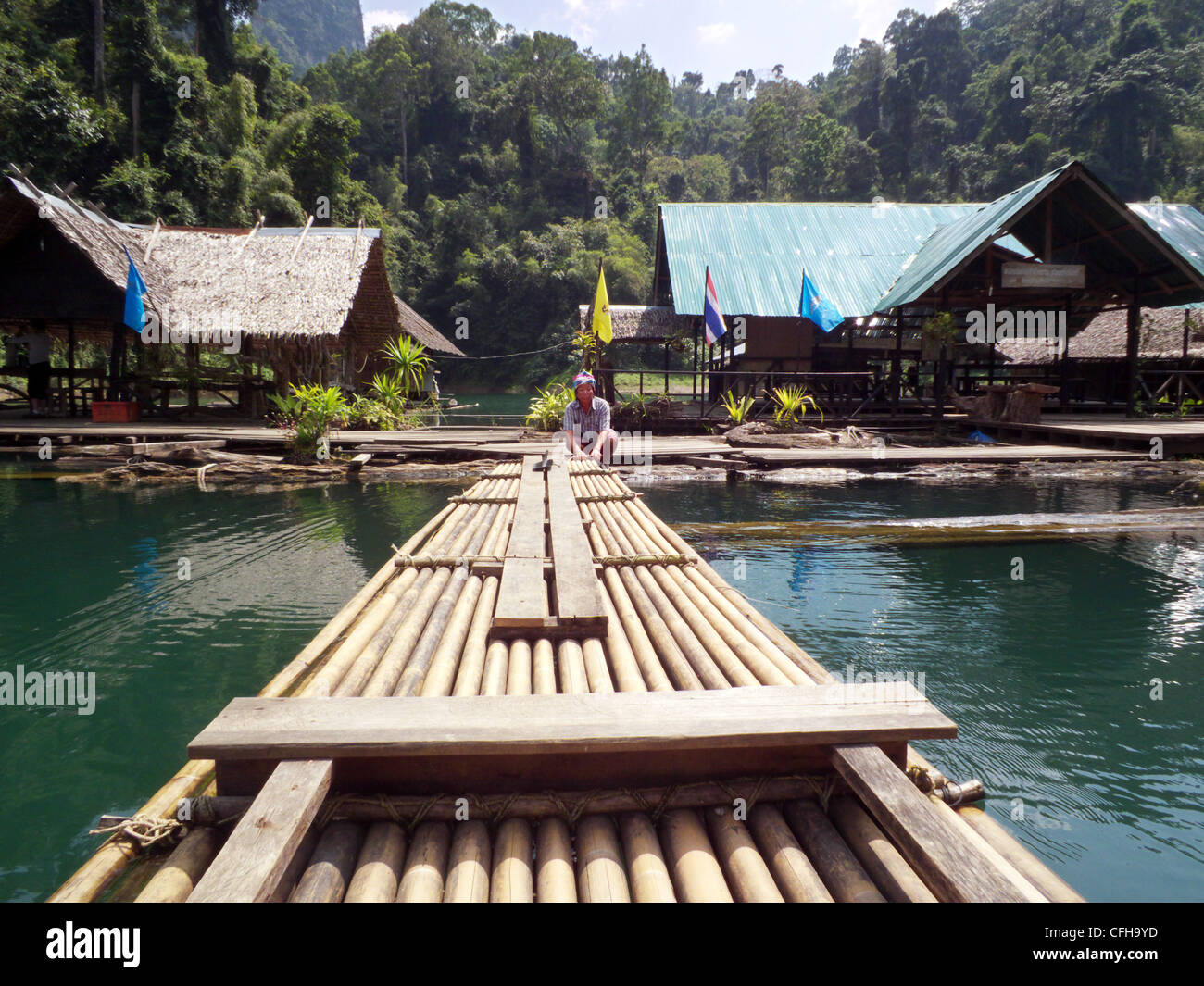 Bamboo raft station on the Chiaw Lan Lake, in the Khao Sok National Park Thailand. Jungle surrounded lake. Tourism. Stock Photo