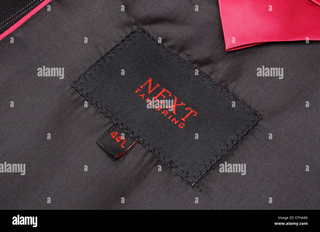 Next clothing brand logo on suit jacket Stock Photo