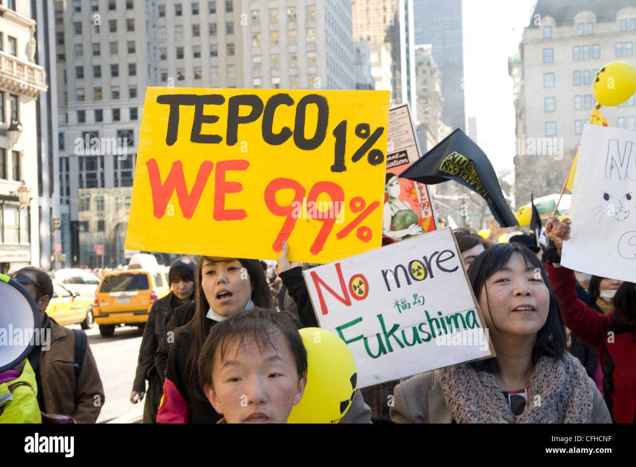 AntiNuclear rally & march in New York City commemorating the 1 year anniversary of the natural and nuclear disaster in Japan. Stock Photo