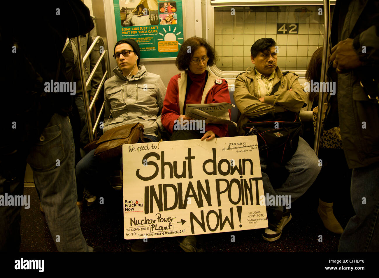 Antinuclear activist riding an NYC subway train. Stock Photo