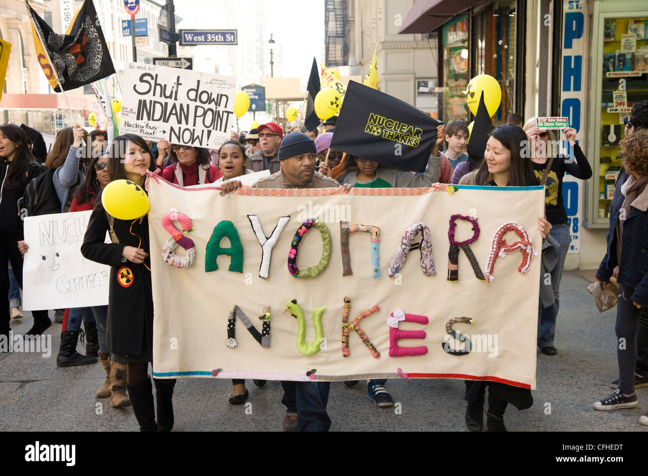 AntiNuclear rally & march in New York City commemorating the 1 year anniversary of the natural and nuclear disaster in Japan. Stock Photo