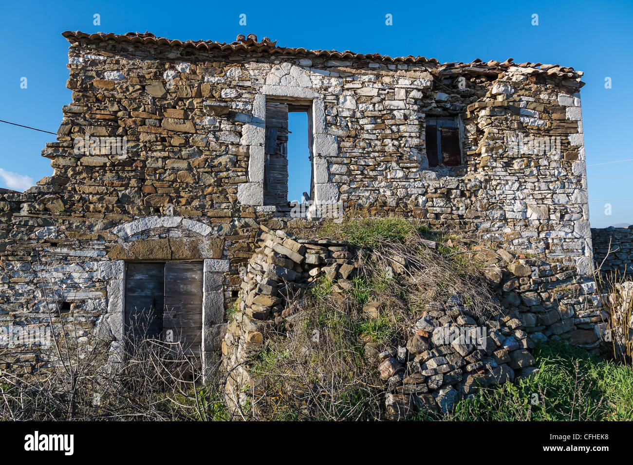 Old abandoned stone house ruins after an earthquake in Greece Stock ...