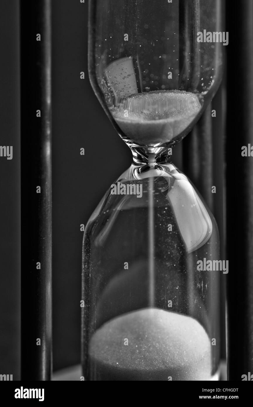 Egg timer depicting the passing of time behind bars or in prison. Stock Photo