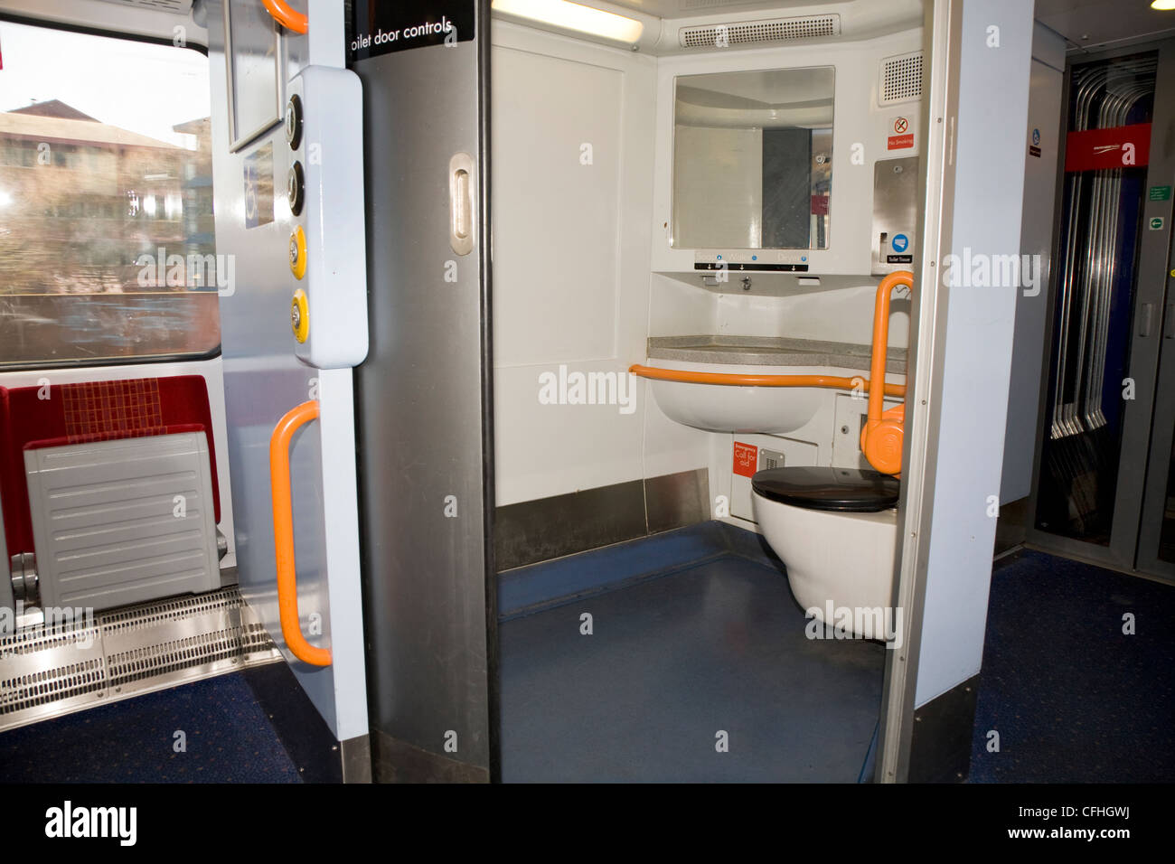 Toilet / lavatory / WC through open door (with disabled person's Stock
