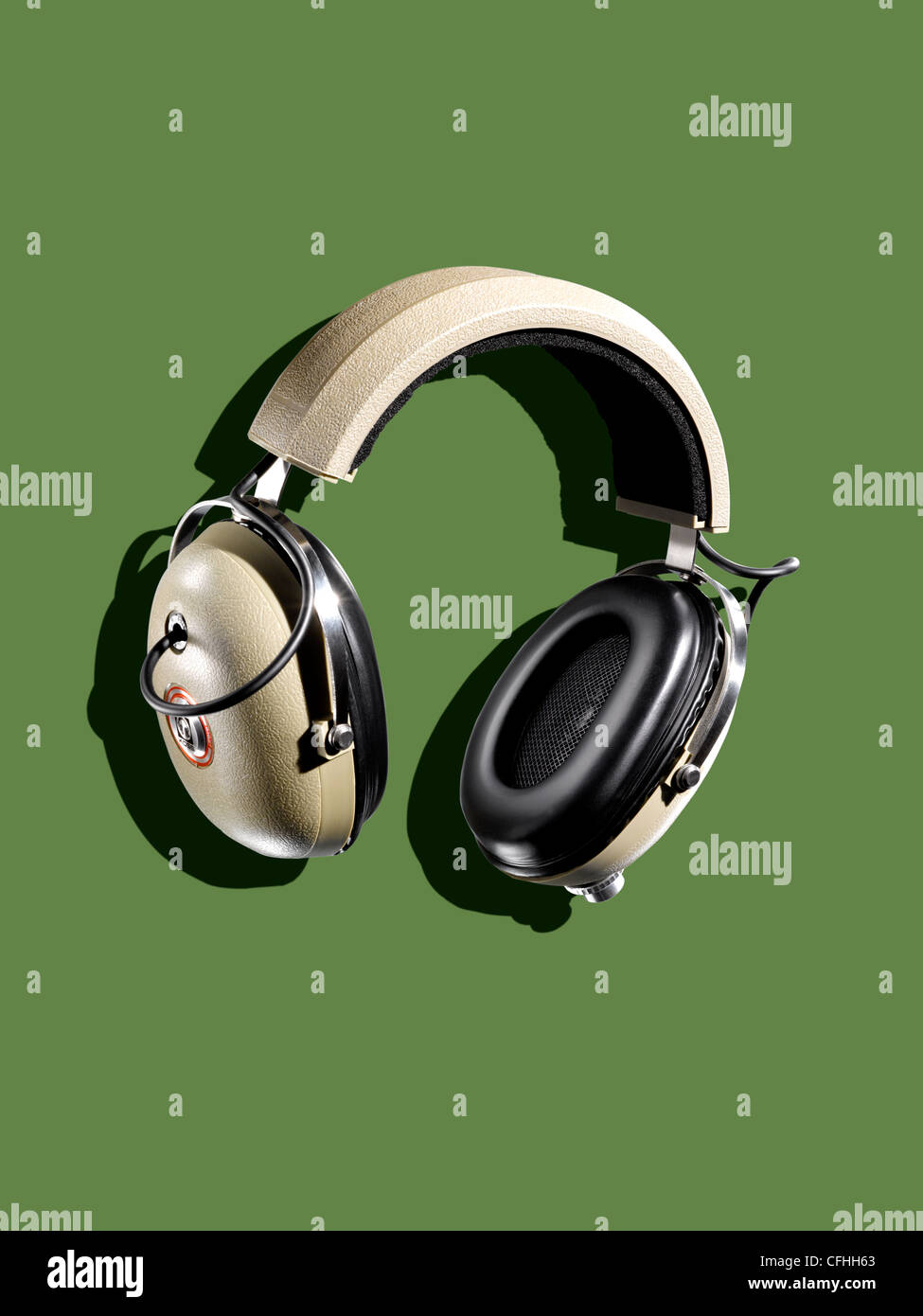 Headphones on a green background Stock Photo
