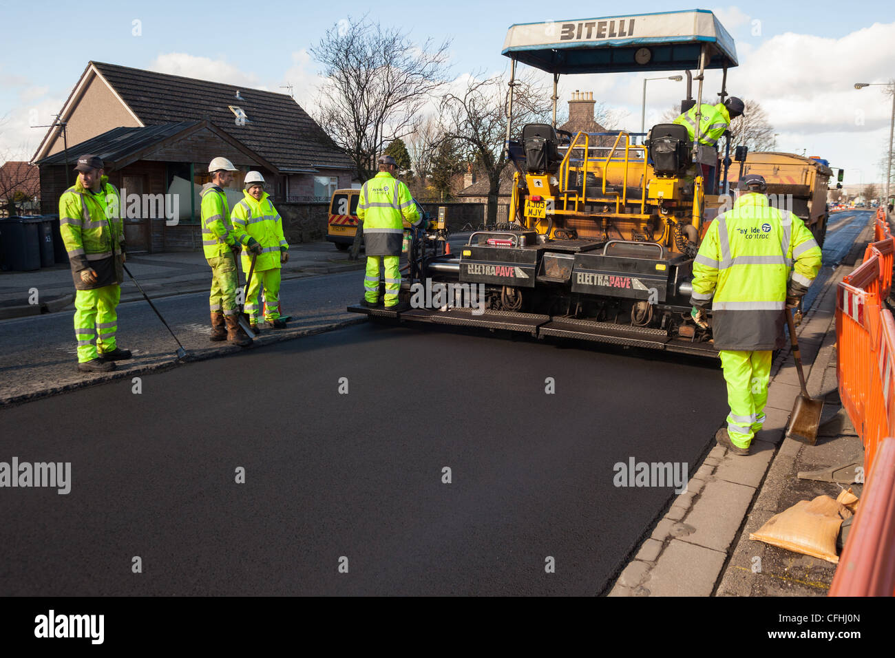 Tarmac asphalt being laid to resurface a road after road damage. Montrose Scotland UK Stock Photo