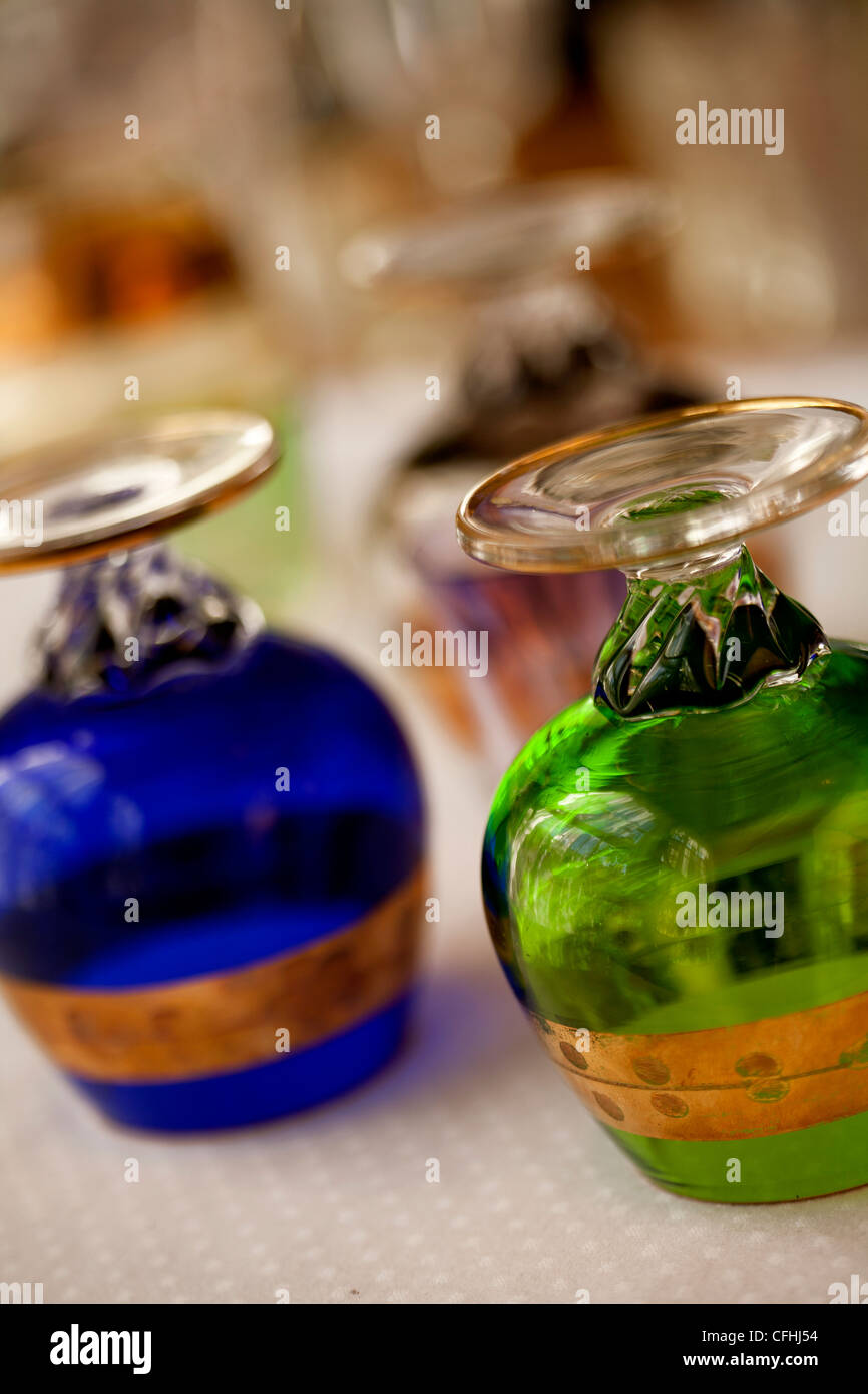 Hand blown, brightly colored, crystal brandy snifters with gold leaf stripes Stock Photo Alamy