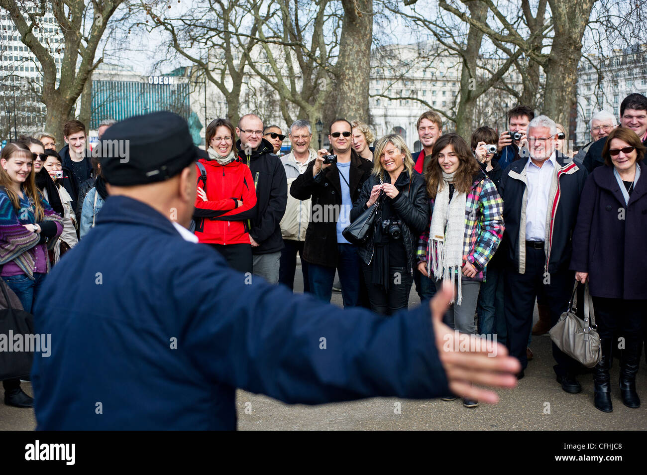 An audience listening to a speaker at Speakers Corner in London Stock Photo