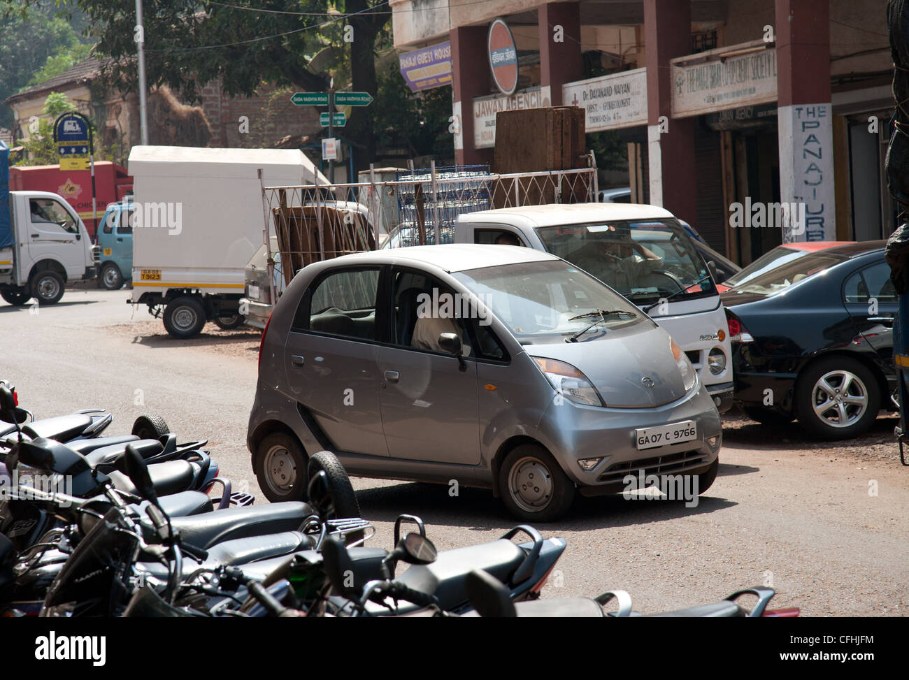 A Tata Nano car on the street in Goa India Stock Photo