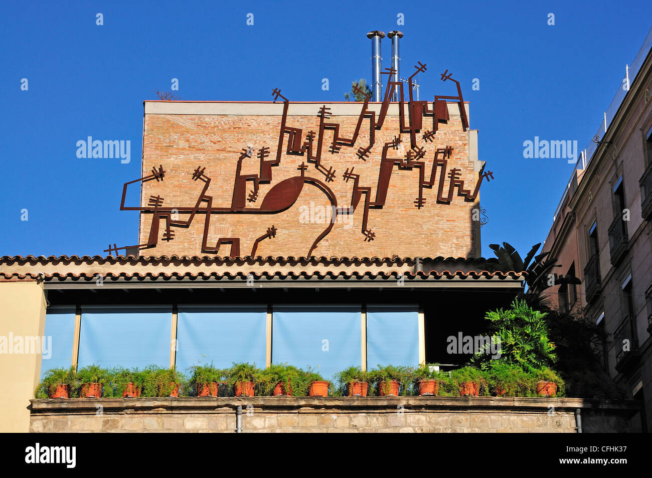 Barcelona, Spain. Metal artwork on roof of building in Calle de Elisabets in the Raval district Stock Photo