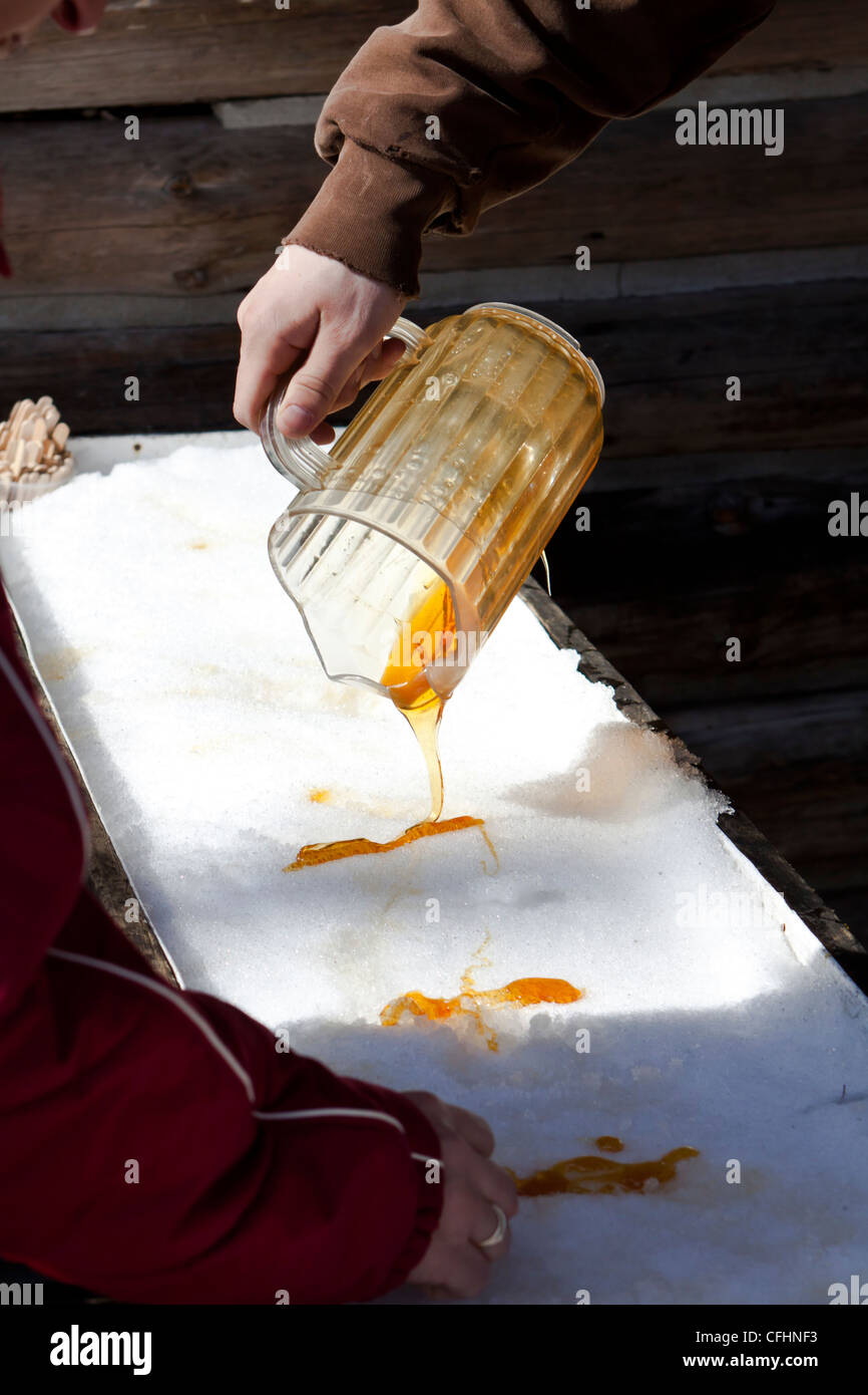 Maple syrup on snow,maple taffy Stock Photo Alamy