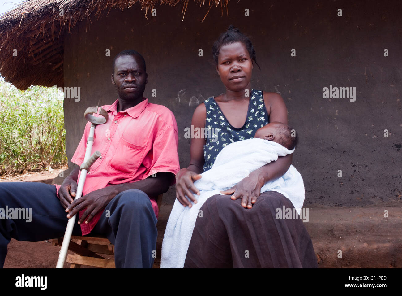 Former child soldiers with the LRA (Lord's Resistance Army), now a couple with their child Stock Photo