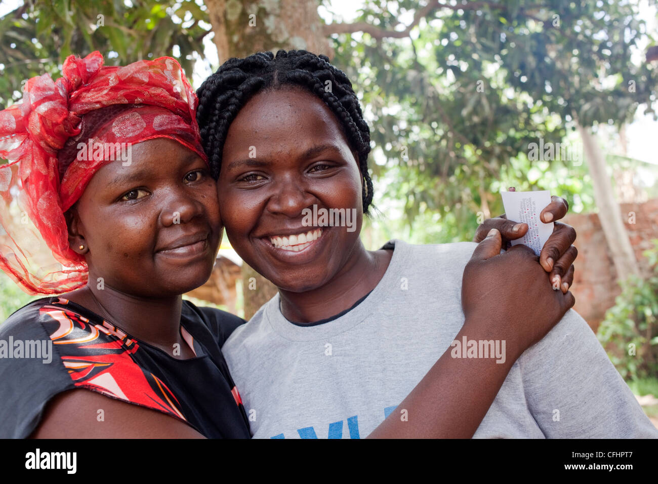 One of Joseph Kony's wives (on left) with a former LRA soldier turned activist, Grace, are posing for a picture Stock Photo