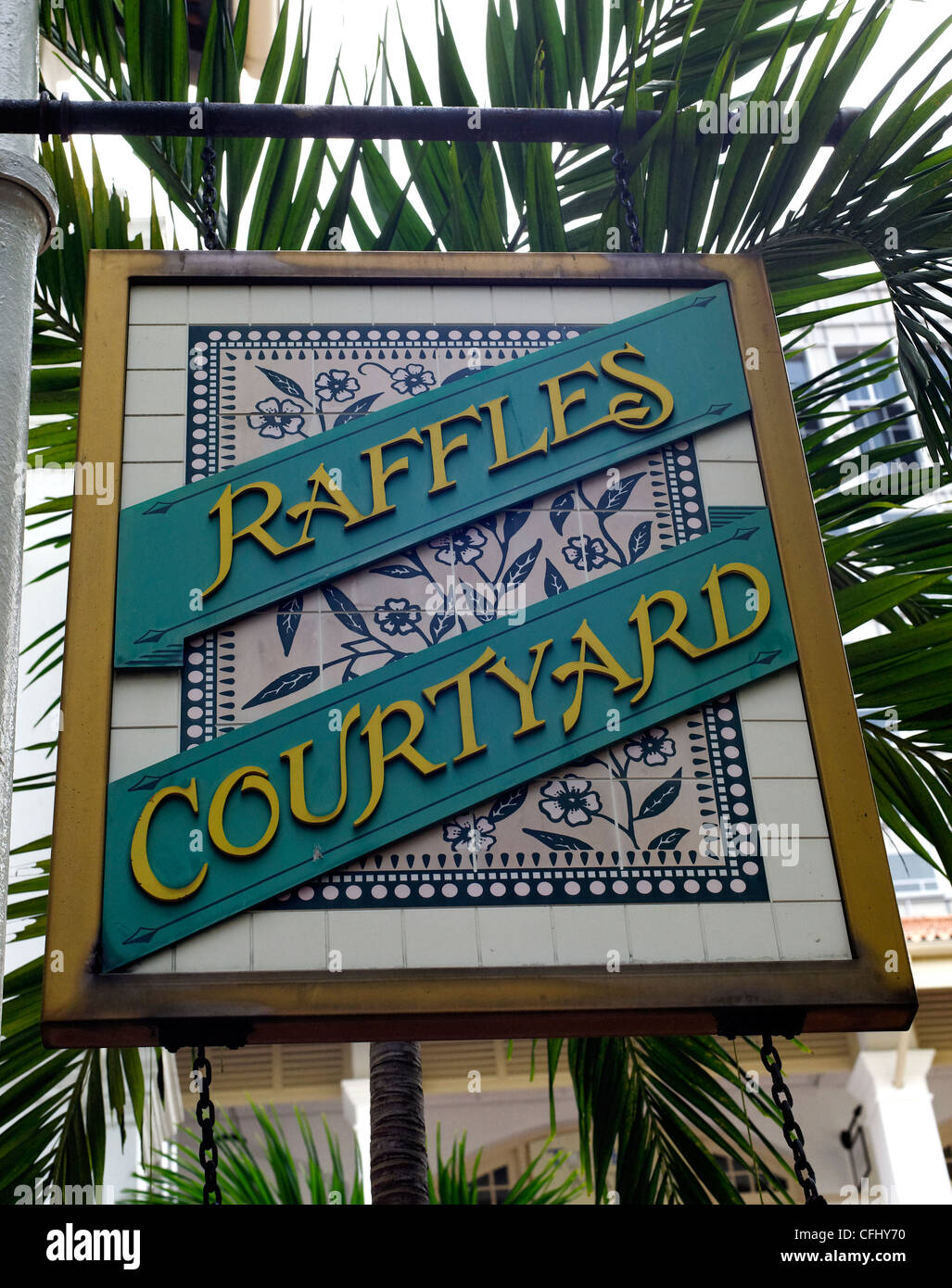 Ornate sign for Raffles Courtyard, Raffles Hotel, Singapore Stock Photo