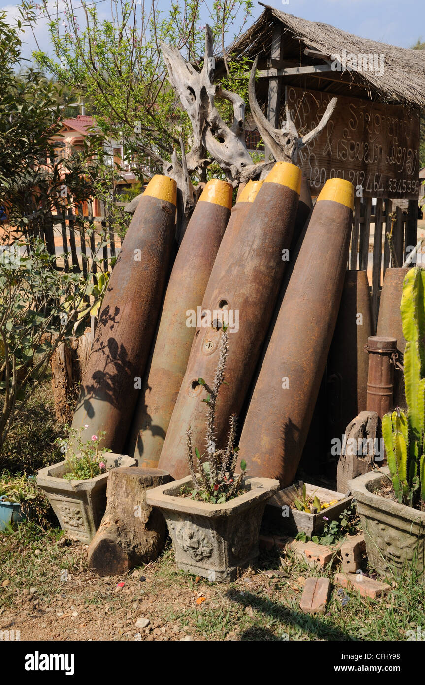 American bomb shells outside a roadside cafe Xieng Khuang Province Northern Laos Stock Photo