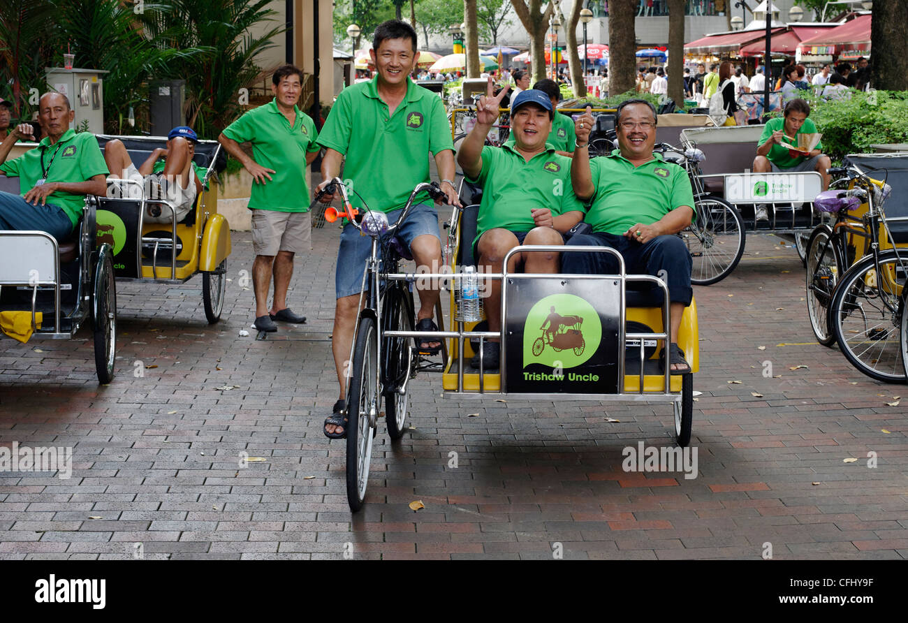Trishaw Uncles by the Albert Mall at Bugis Junction, Singapore Stock Photo