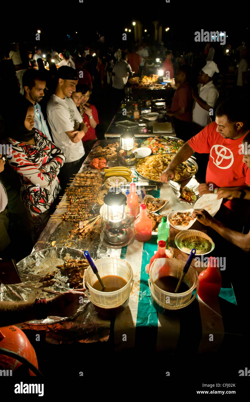 Stalls with cooked food at Forodhani Gardens Stone Town Zanzibar Tanzania Stock Photo