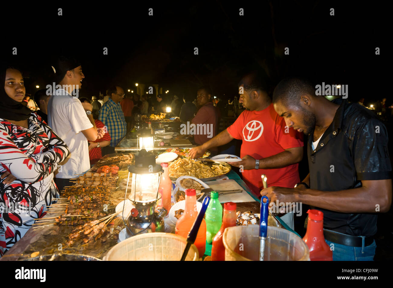 Stalls with cooked food at Forodhani Gardens Stone Town Zanzibar Tanzania Stock Photo