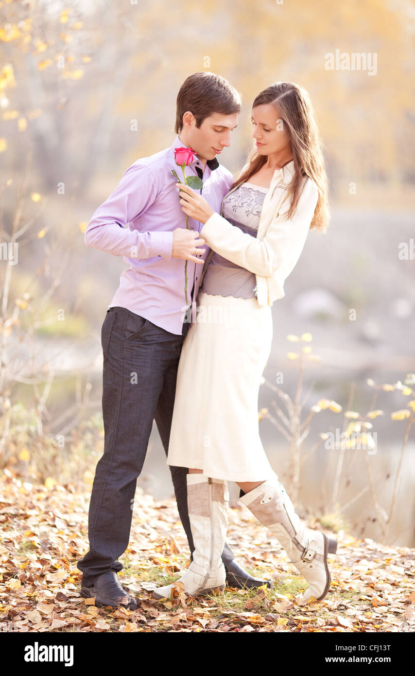 happy young couple in the park Stock Photo - Alamy