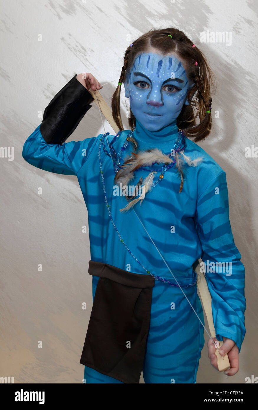 Young girl of 7 dresses up as Neytiri (a Na'vi) from the 2009 Avatar film for purim Stock Photo
