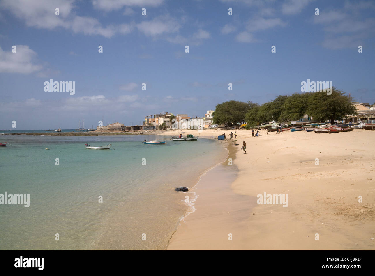 Sal Rei Boa Vista Cape Verde Locals on golden sands of Praia Diante city  skyline behind Stock Photo - Alamy