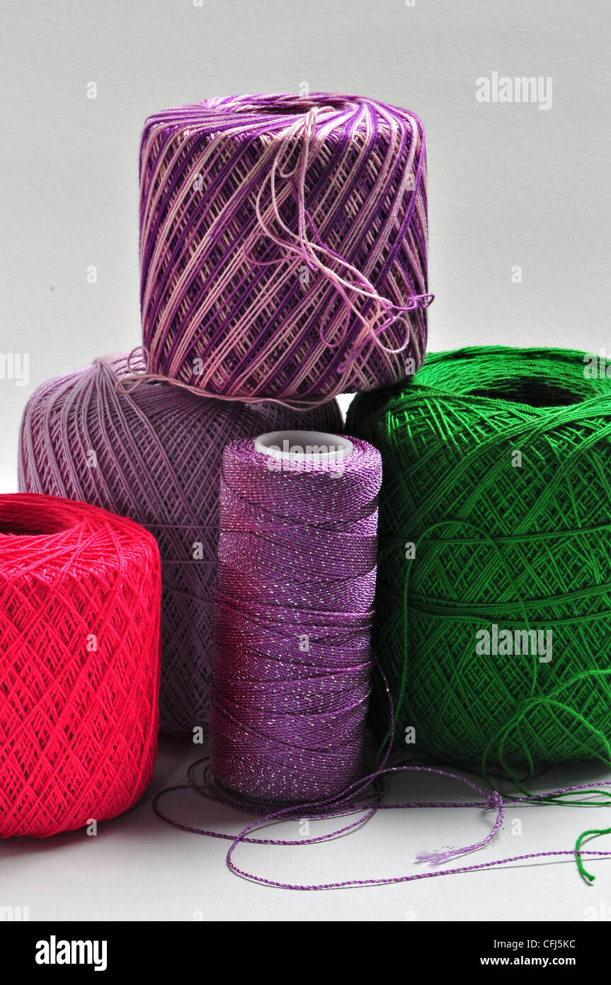 Various color's of yarn are on a white background. Stock Photo