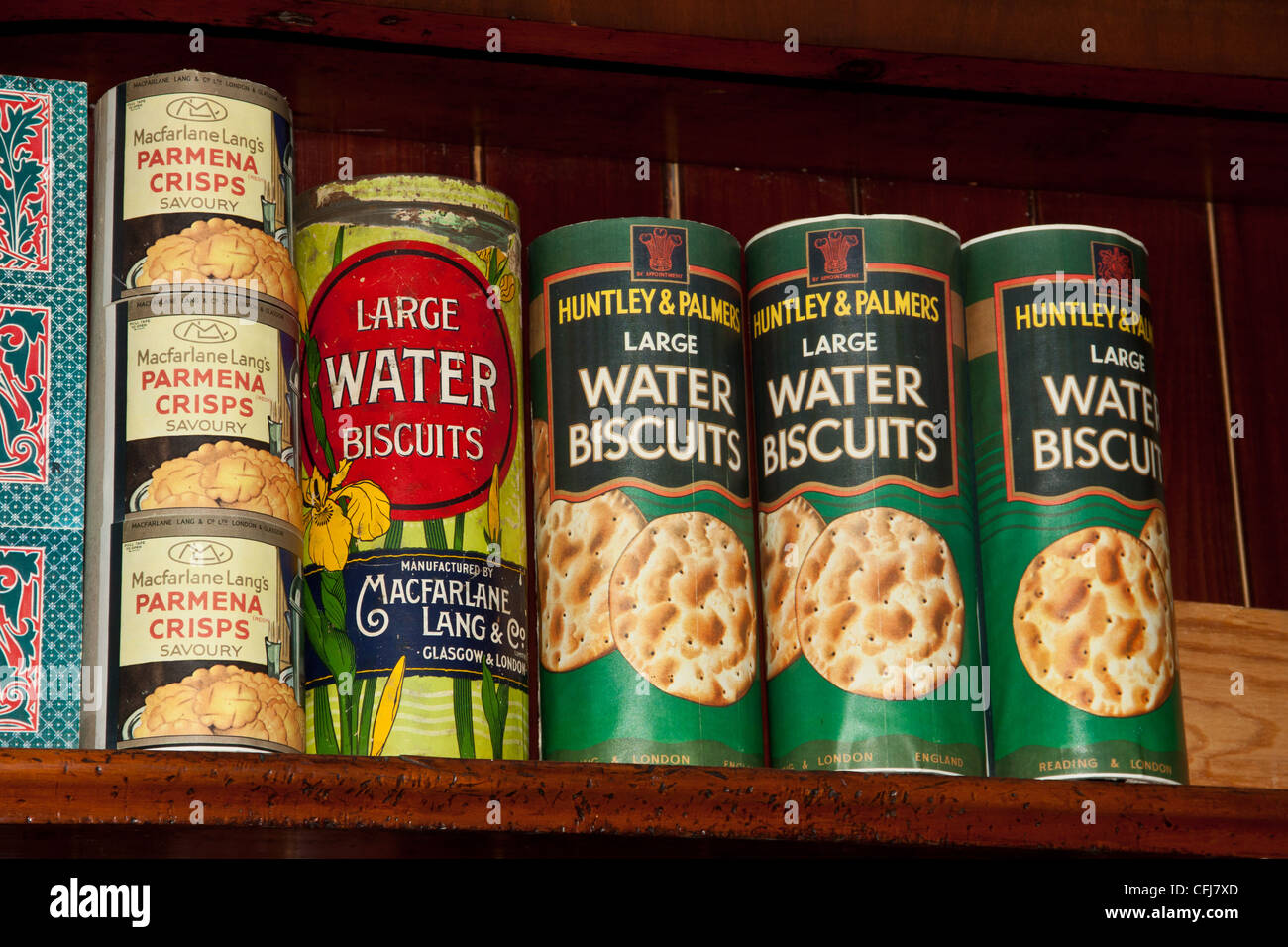 Tinned food and produce from a bygone era, old fashioned style general grocers and supply store from early 1930's. Stock Photo