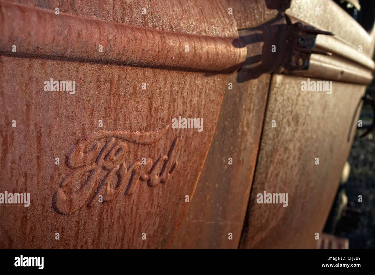 Ford Logo Detail On Fender Of Rusty Old Truck Stock Photo