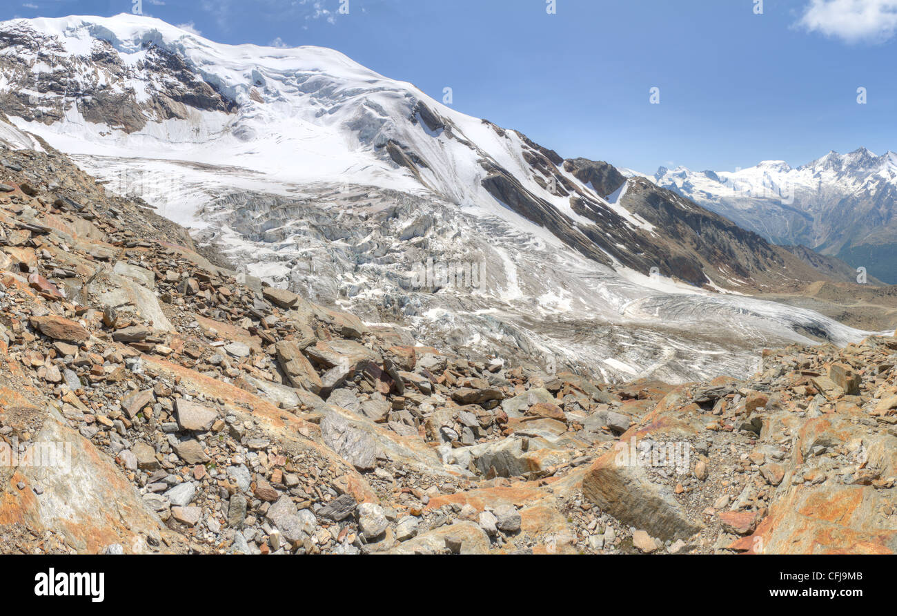 alpine panorama: view above Saas Fee valley with glacier Switzerland, concept for enjoying mountains and nature Stock Photo