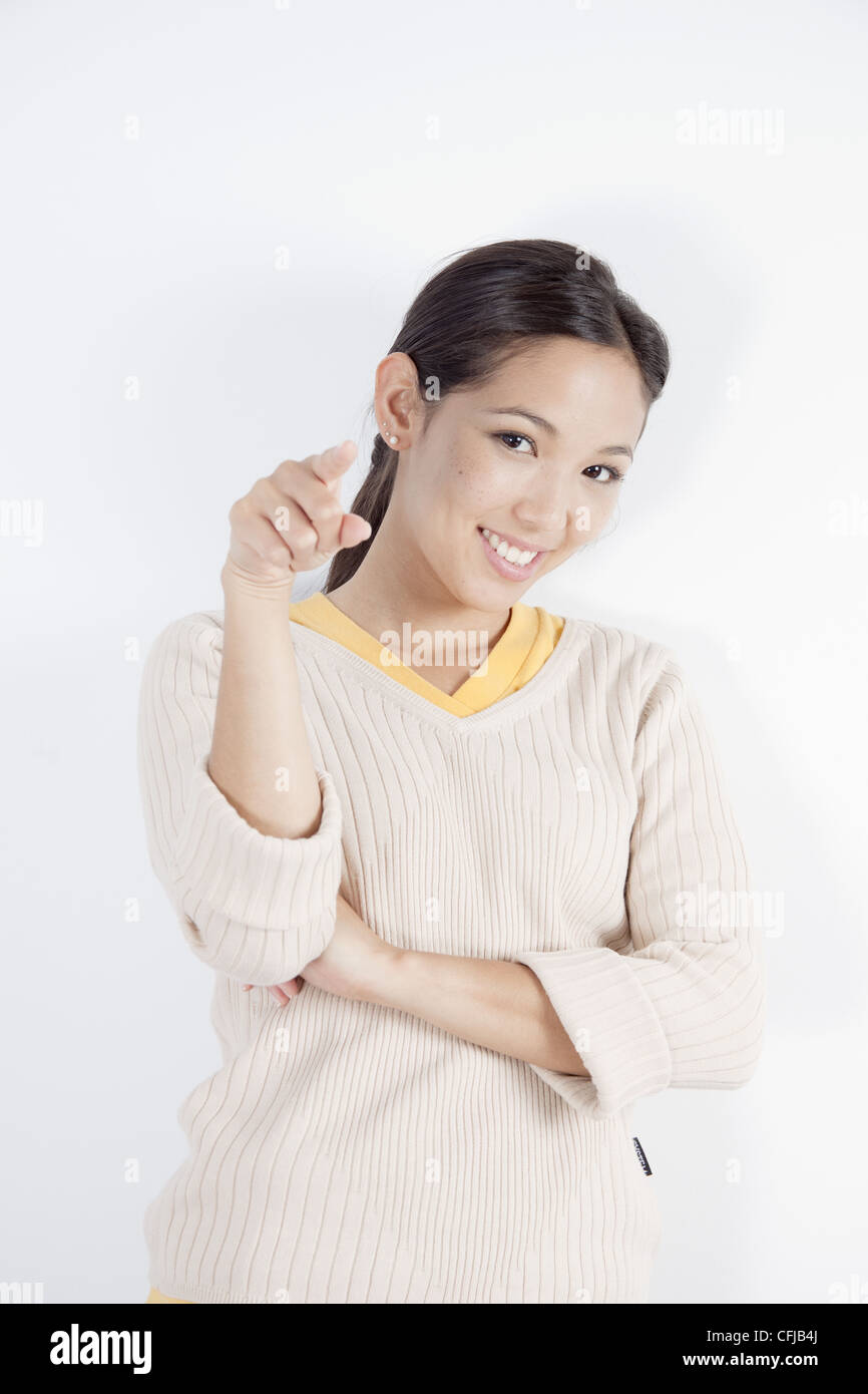 Back view pointing woman hi-res stock photography and images - Alamy